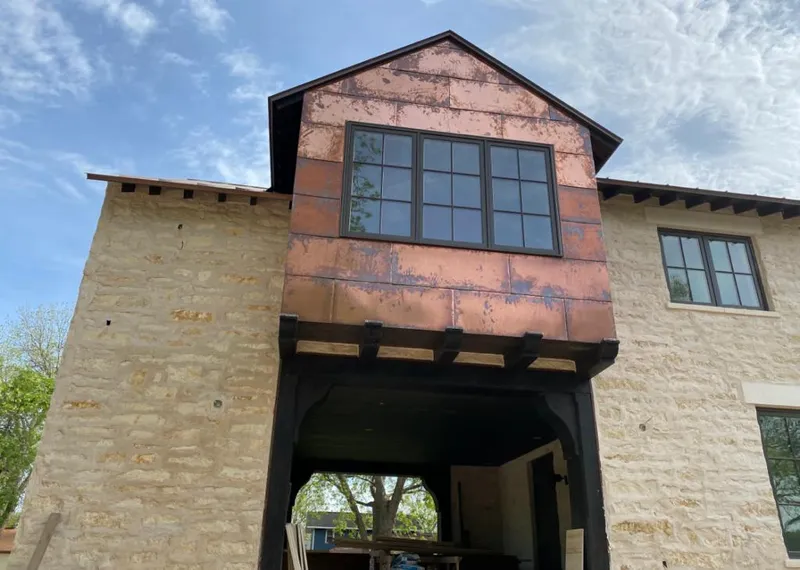 Copper metal panel facade on a stone building for Skylight Installation in Marina del Rey