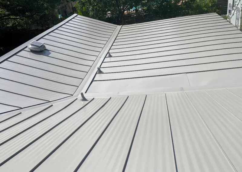 Solar attic fan installed on a metal roof for Roof Ventilation in Marina del Rey